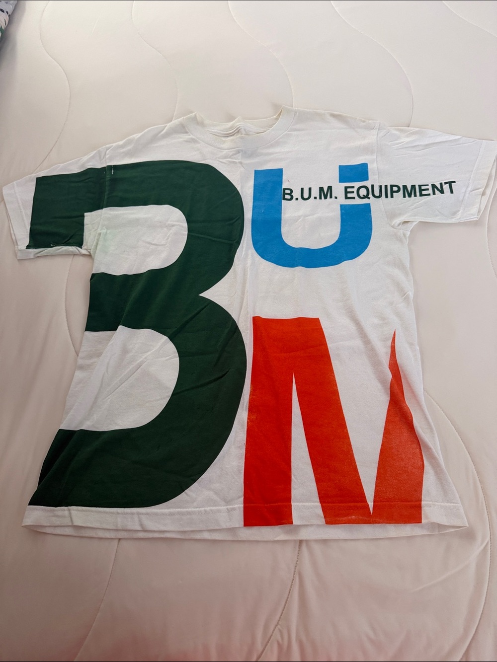 Bum Equipment MensWhite Tee with Large Green, Blue & Red Lettering